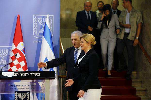 Israeli Prime Minister Benjamin Netanyahu gestures as he arrives with Croatia