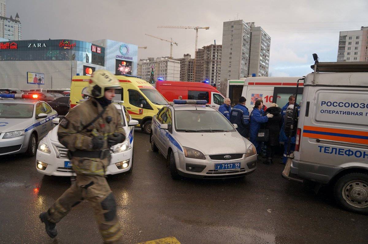 Rescue personnel work at the scene of a crash involving a passenger bus in Moscow