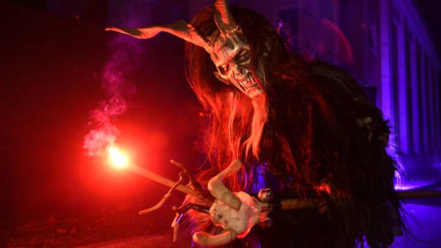 A man dressed as a devil performs during a Krampus show in Goricane