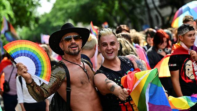 People attend the annual Pride march in Budapest