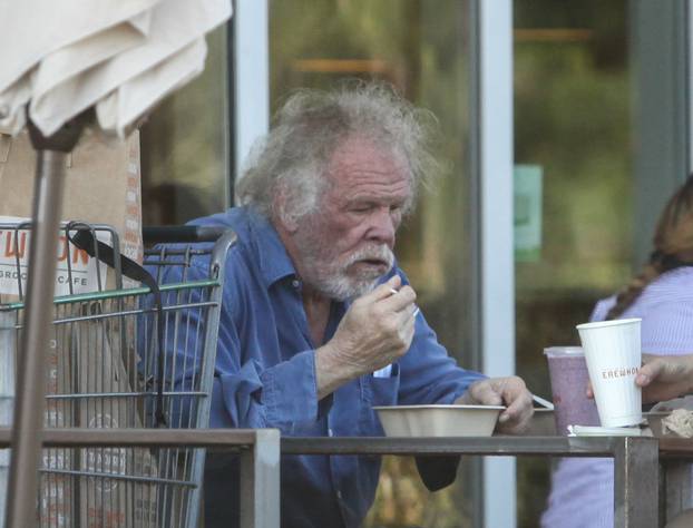 EXCLUSIVE: Nick Nolte has lunch and a smoothie with a friend while grocery shopping