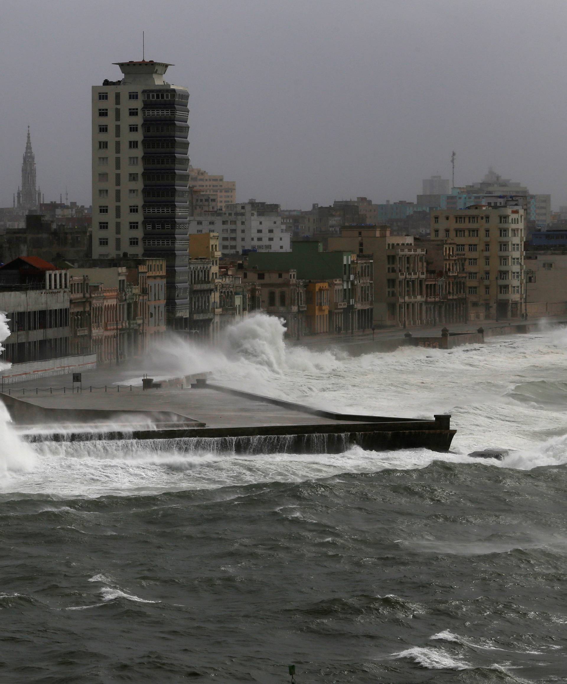 Waves crash against the seafront boulevard El Malecon as Hurricane Irma turns toward the Florida Keys on Saturday, in Havana