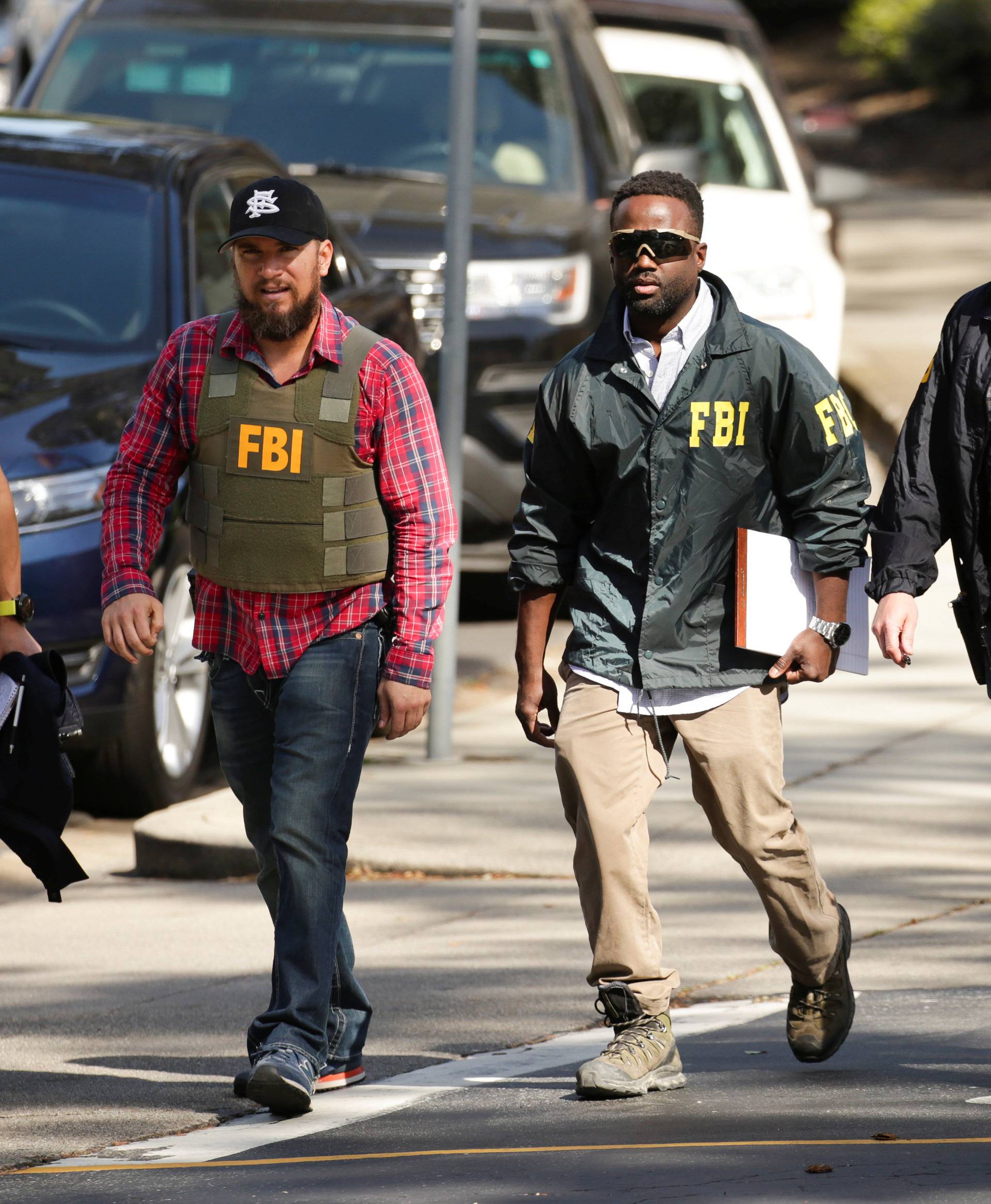 FBI agents are seen near Youtube headquarters following an active shooter situation in San Bruno, California