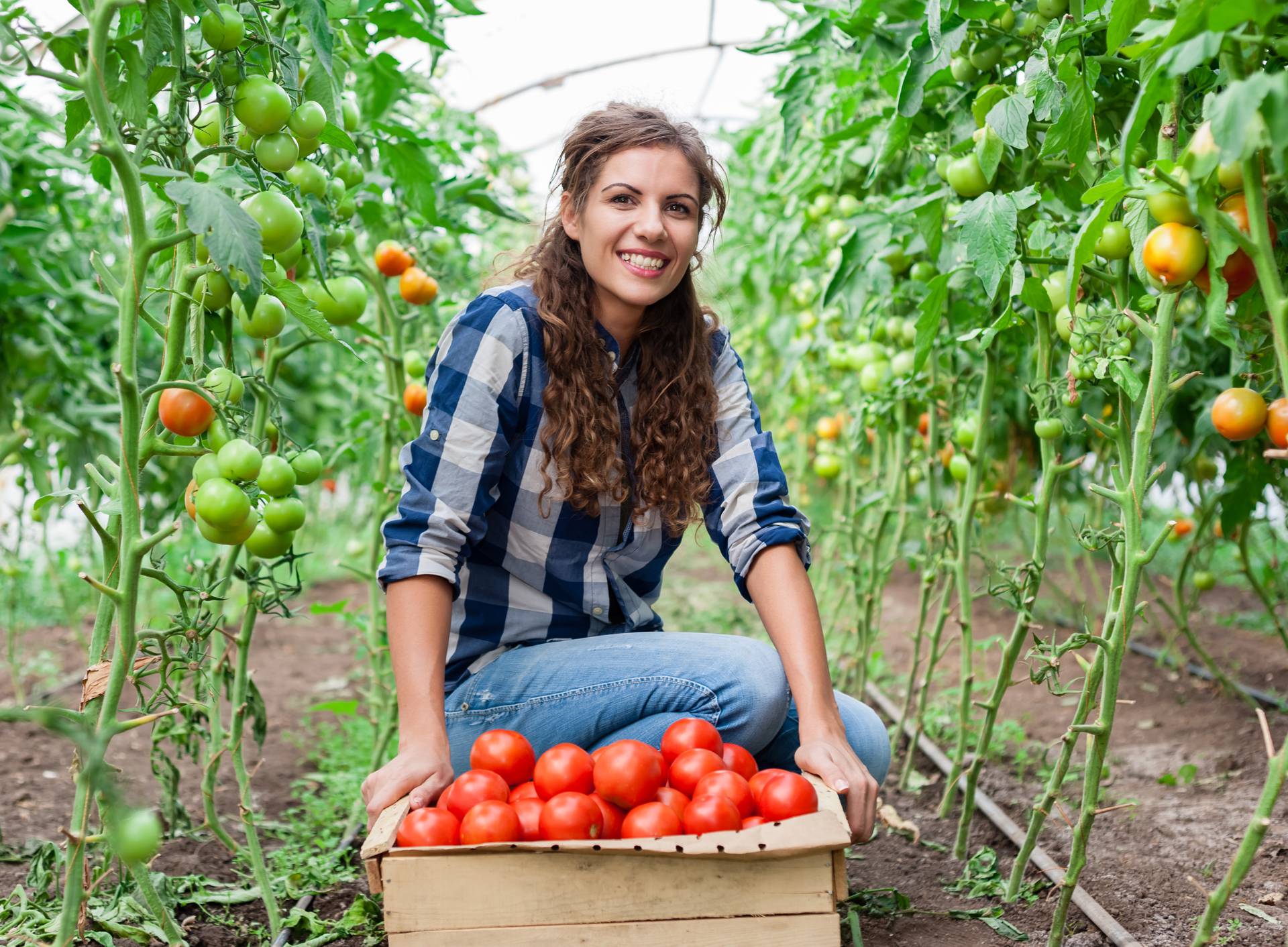 Young smiling agriculture woman worker