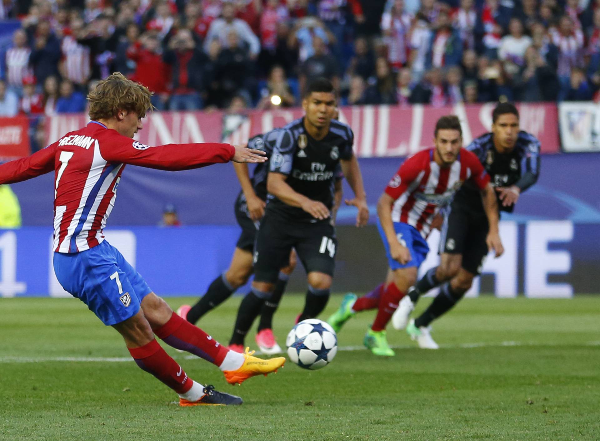 Atletico Madrid's Antoine Griezmann scores their second goal from the penalty spot