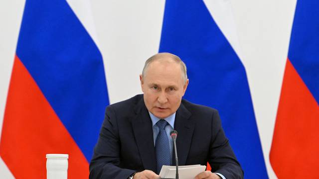 Russian President Vladimir Putin chairs a meeting in Izhevsk