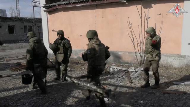 Members of the Russian military operate in a location given as Avdiivka