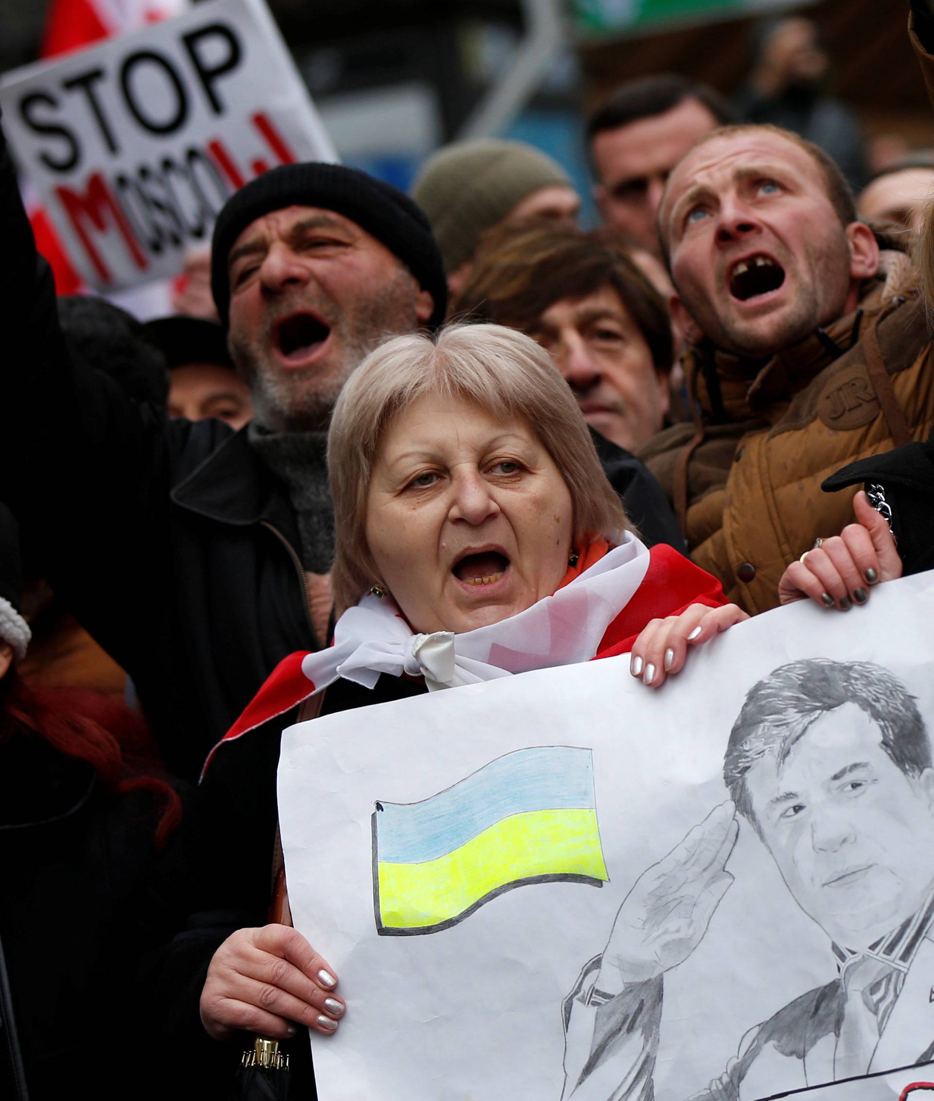 Protesters march to support Georgian former President Mikheil Saakashvili in Tbilisi