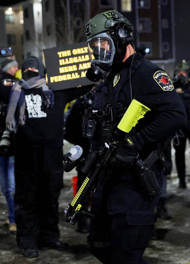Protest outside the hotel where Bovino, who has been removed from his role, is reportedly staying, in Maple Grove