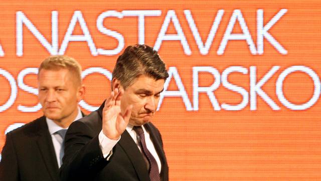 Zoran Milanovic, president of Social Democratic Party (SDP), reacts at a press conference after a parliamentary election in Zagreb