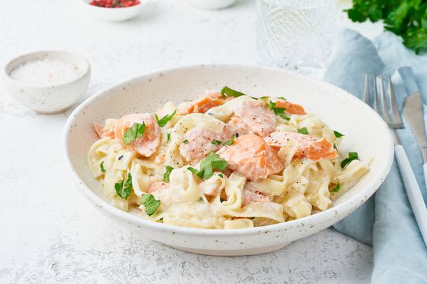 Salmon,Pasta,,Tagliatelle,With,Fish,And,Creamy,Sauce.,Italian,Dinner
