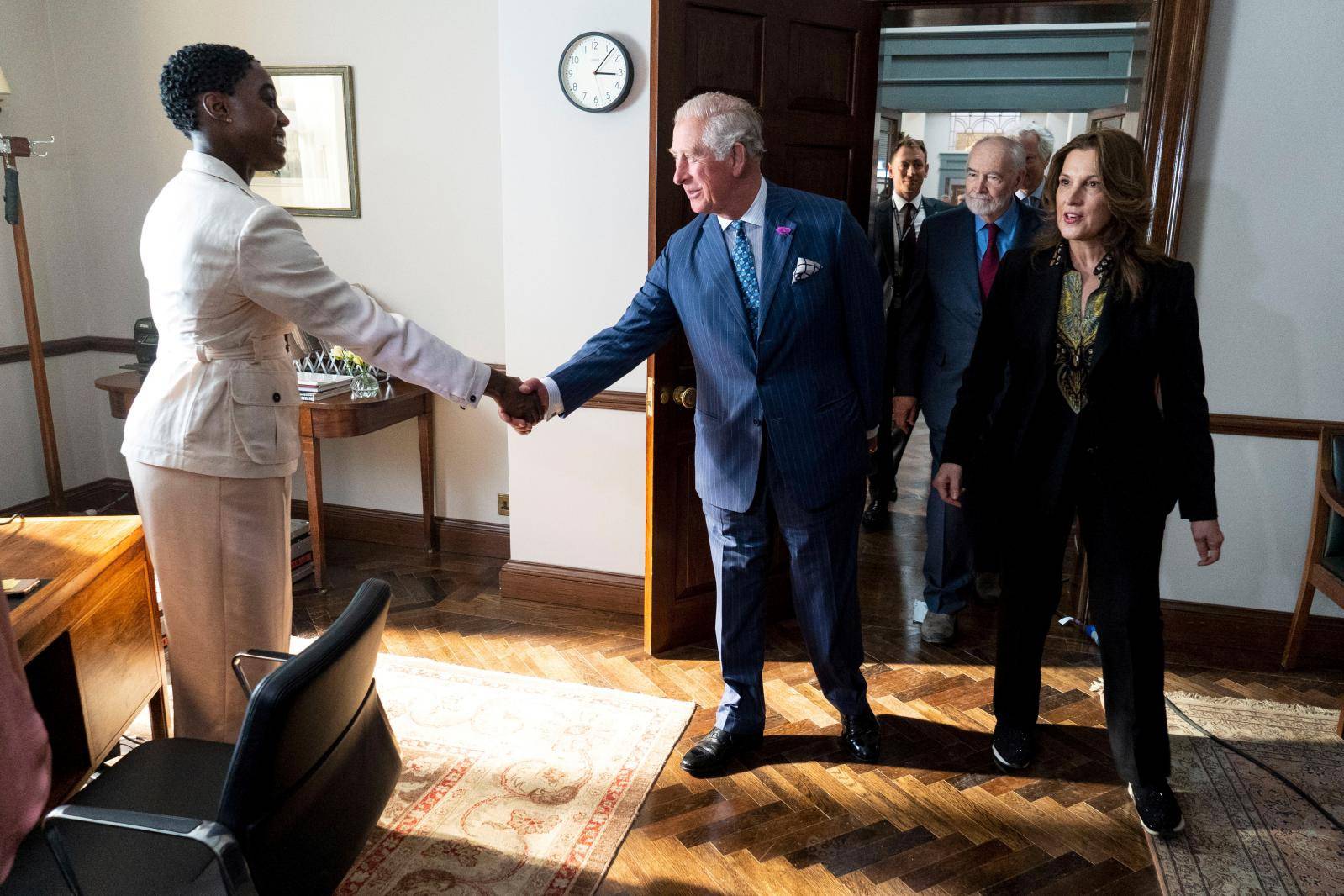 Britain's Prince Charles visits the set of James Bond at Pinewood Studios