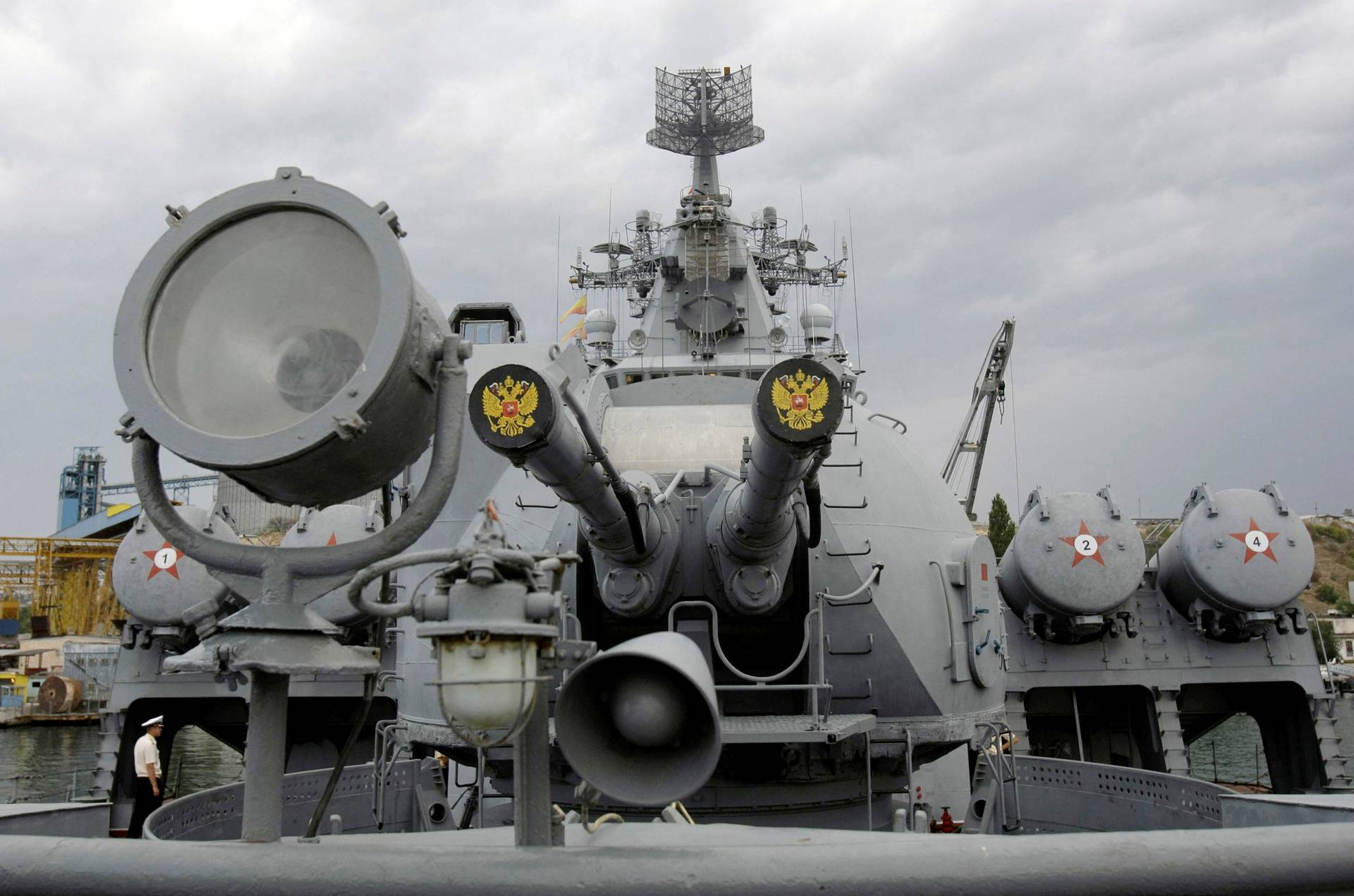 FILE PHOTO: Russia's coat of arms, the double headed eagle, is seen on covers of the missile cruiser Moskva in the Ukrainian Black Sea port of Sevastopol