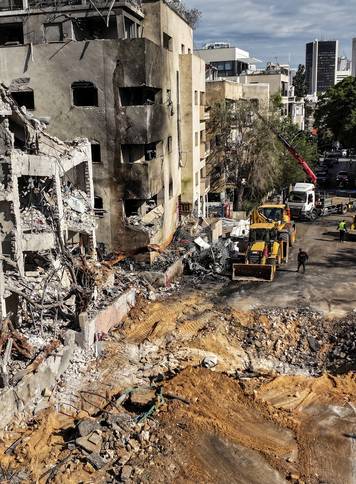 A drone view of the site of an Iranian missile strike on a residential building, after Iran launched missile barrages following attacks by the U.S. and Israel, in Tel Aviv