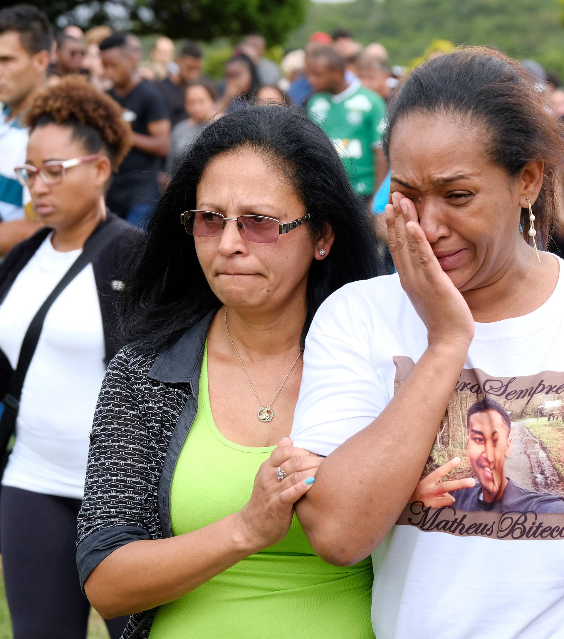 Fabiane Bitencourt, mother of Chapecoense soccer club player Matheus Biteco, who died in the plane crash in Colombia, reacts during his burial in Porto Alegre