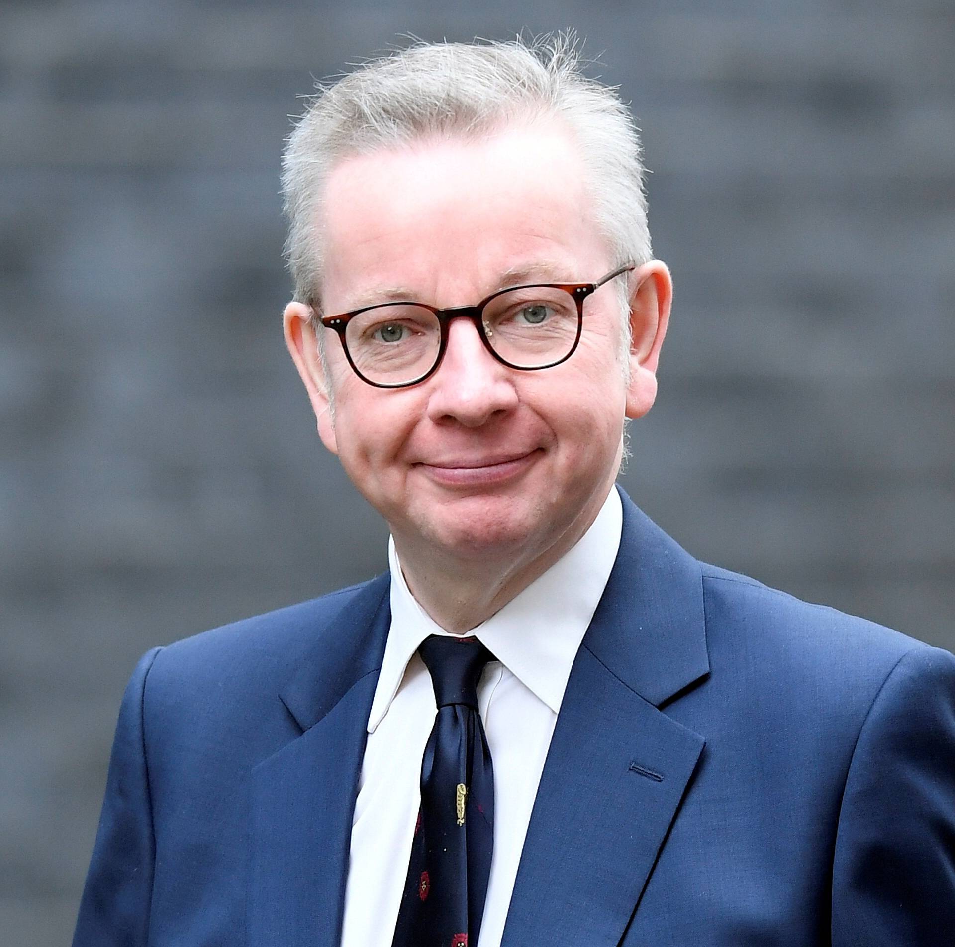 FILE PHOTO: Michael Gove arrives at Downing Street in London