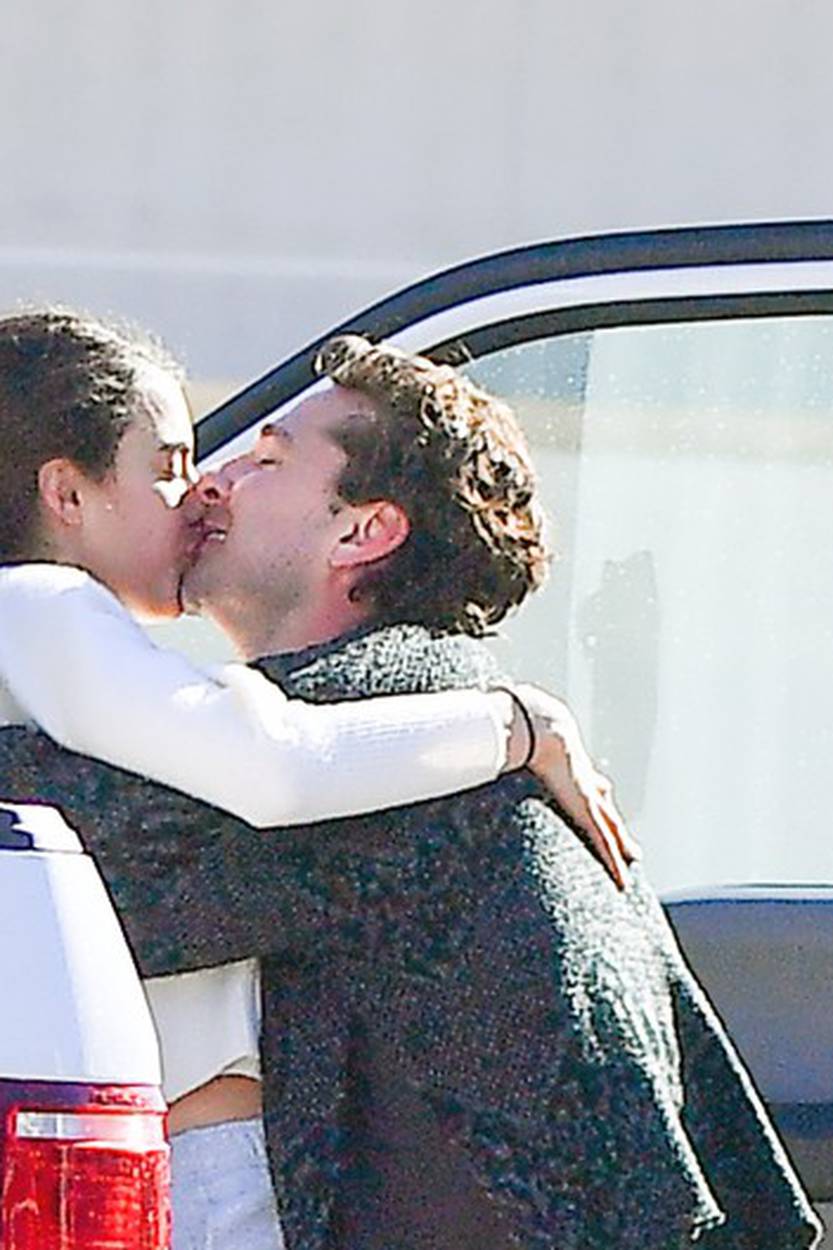 *PREMIUM EXCLUSIVE NO WEB UNTIL 3PM EST 21ST DEC* New Couple Alert!! Shia LaBeouf attempts to put his recent troubles behind him as he takes part in a major PDA session with actress and model Margaret Qualley