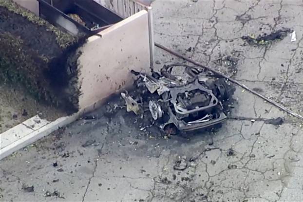 Debris is spilled onto the street after what the Mayor described as a bomb exploded in Palm Springs