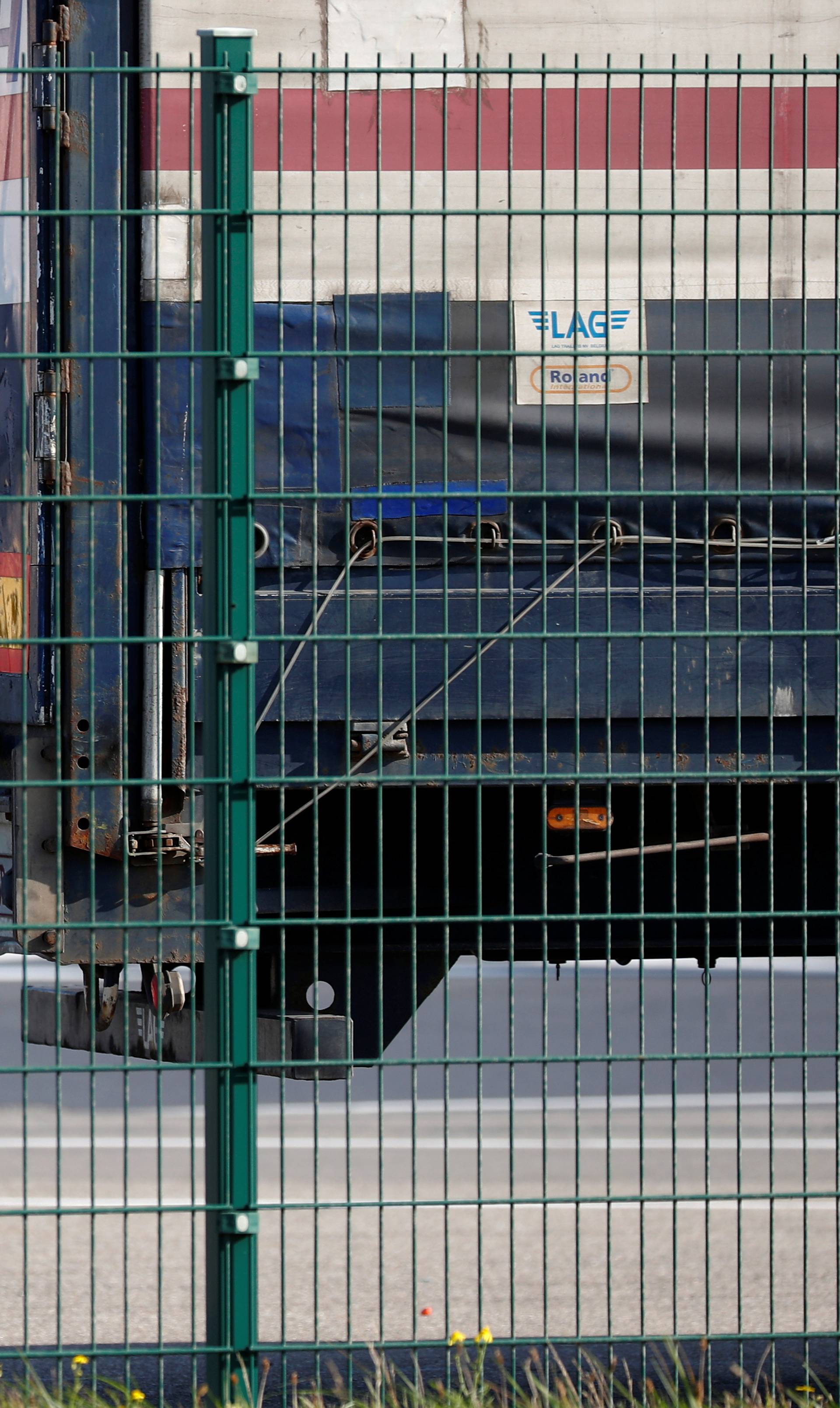 A truck driver is seen at the port of Zeebrugge after British police found bodies inside a lorry container in Grays, Essex, in Zeebrugge