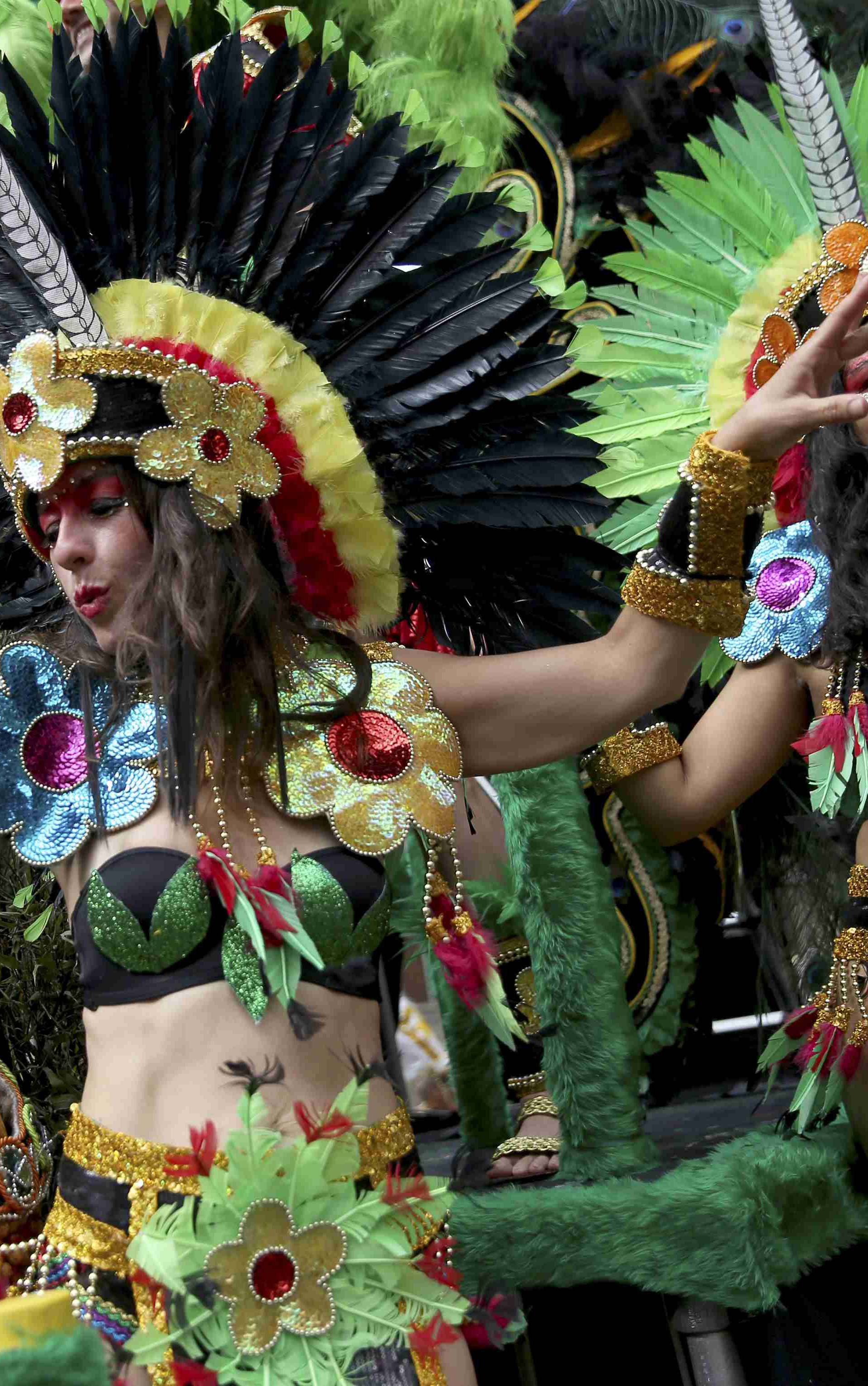 Performers participate in the parade at the Notting Hill Carnival in London