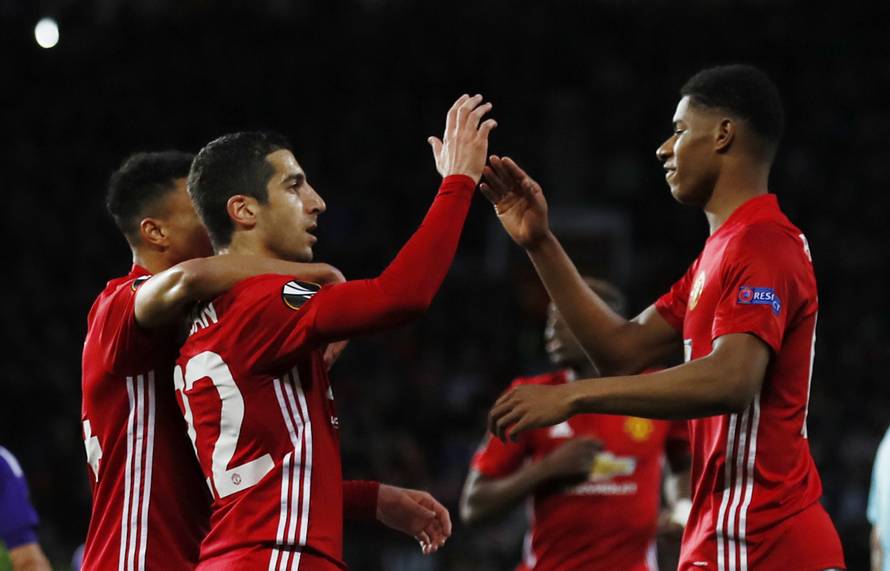 Manchester United's Henrikh Mkhitaryan celebrates scoring their first goal with Marcus Rashford