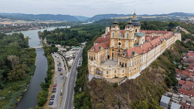 A drone view of Melk Abbey, a Benedictine abbey on the Danube river, above Melk