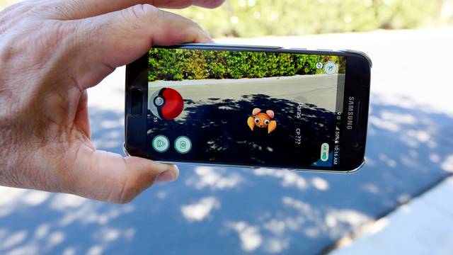 Illustration of the augmented reality mobile game "Pokemon Go"