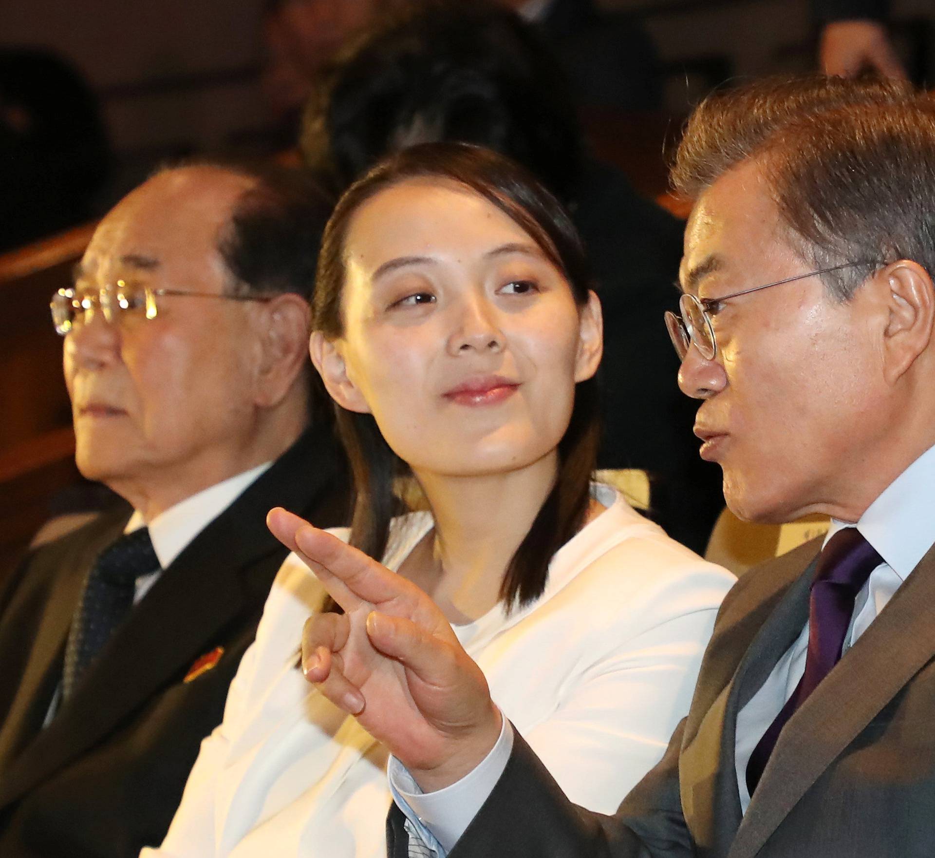 South Korean President Moon Jae-in talks with Kim Yo Jong, the sister of North Korea's leader Kim Jong Un, while watching North Korea's Samjiyon Orchestra's performance in Seoul