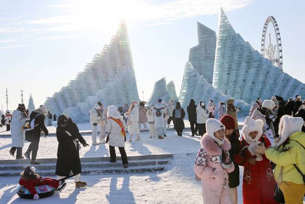 People visit the annual Ice and Snow Festival in Harbin
