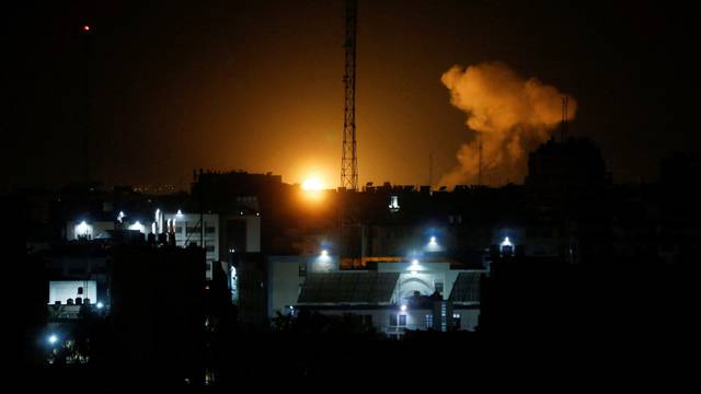 Smoke and flames rise during Israeli airstrikes in Gaza City