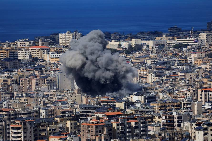 Smoke billows after an Israeli strike on Beirut's southern suburbs