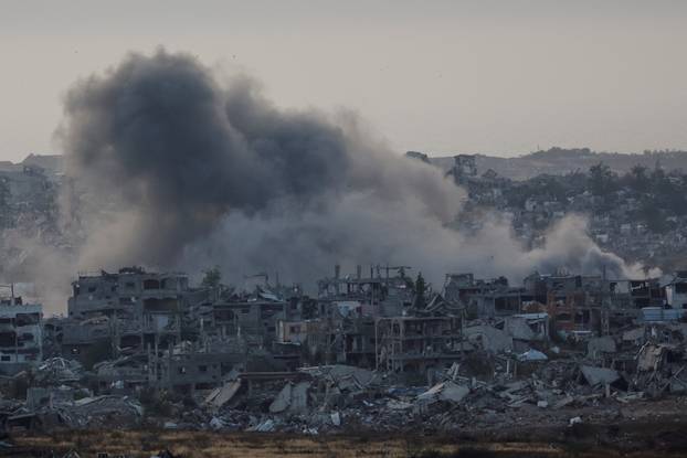 Smoke rises from Gaza following an explosion, as seen from Israel