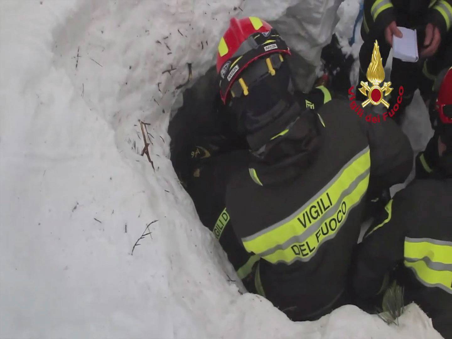 Firefighters rescue a survivor from Hotel Rigopiano in Farindola