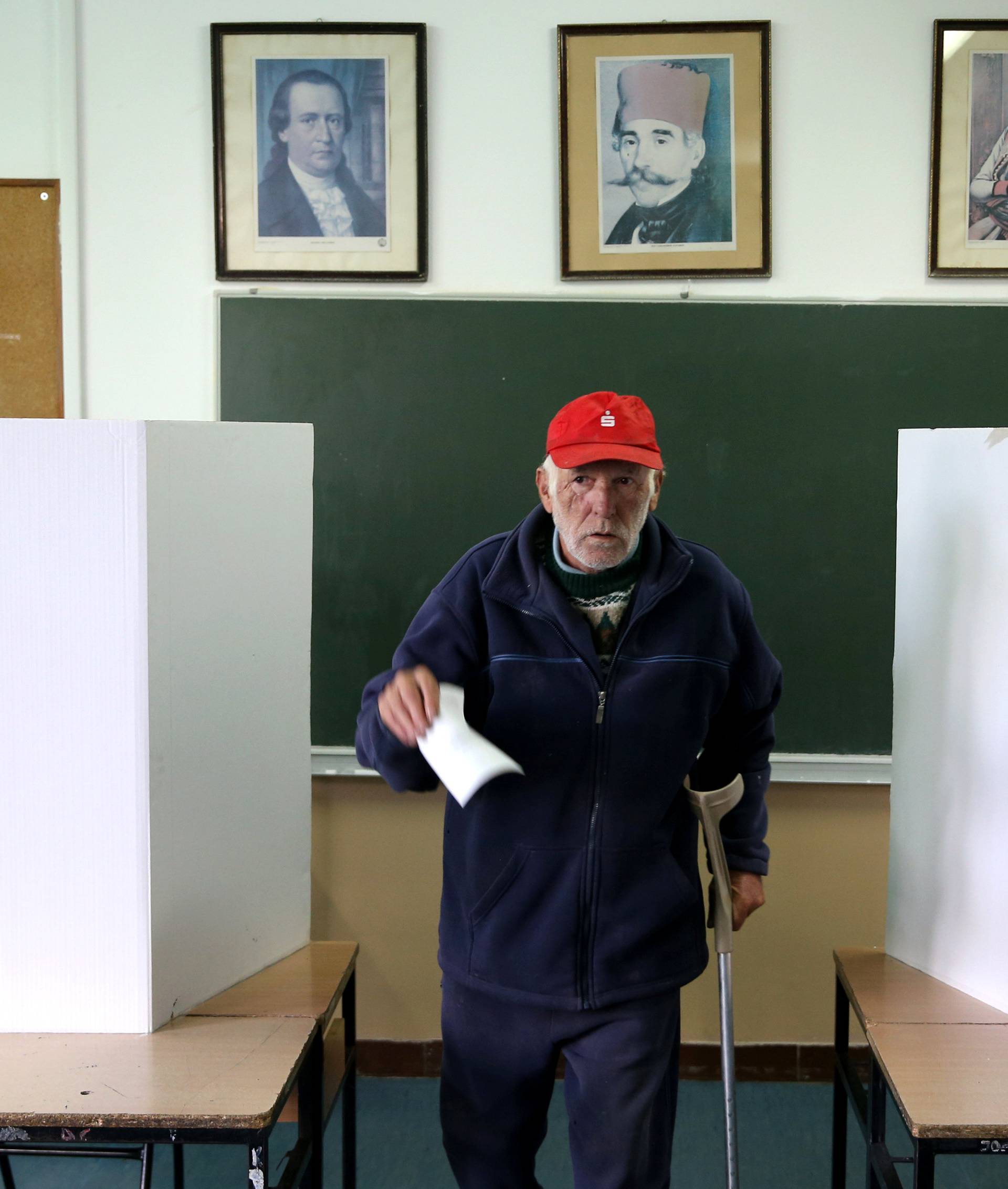 A man votes during a referendum in Laktasi