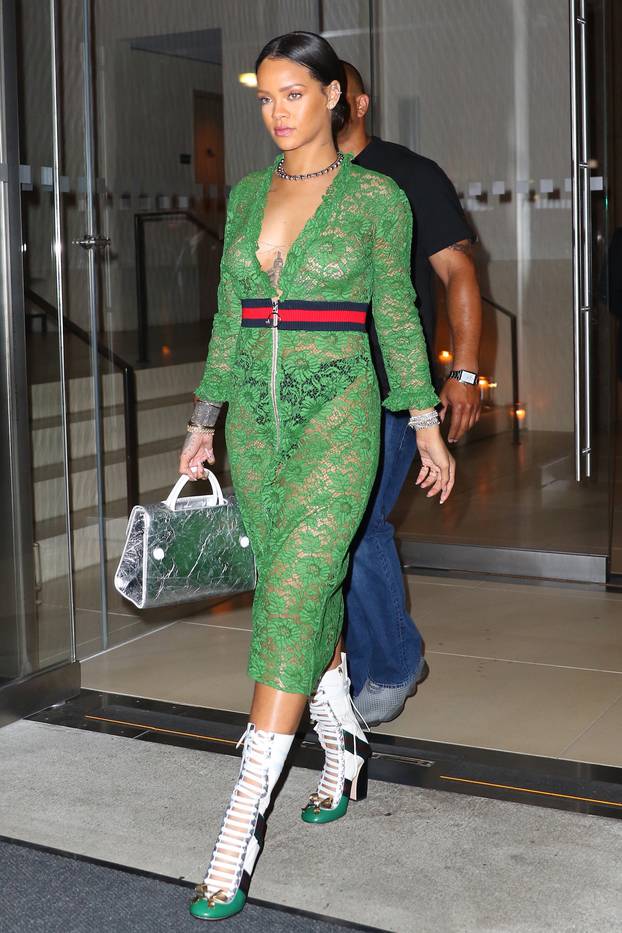 Rihanna is Gucci-down in green lace dress and leather high boots