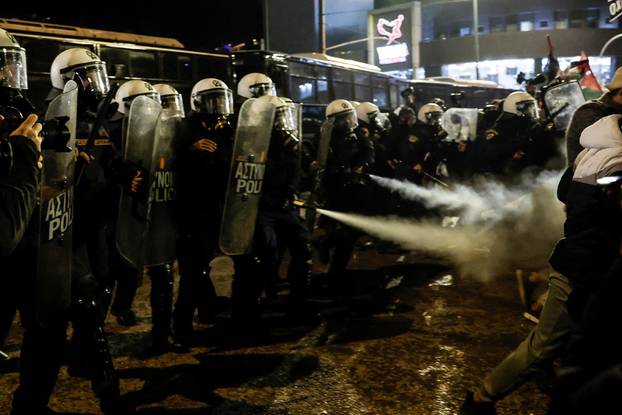 Palestinians and pro-Palestinian protesters demonstrate outside the Israeli embssy in Athens