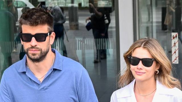 Gerard Pique and Clara Chia brave the media frenzy in Barcelona