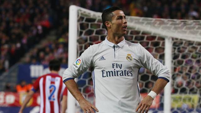 Real Madrid's Cristiano Ronaldo celebrates scoring their third goal and his to complete his hat trick