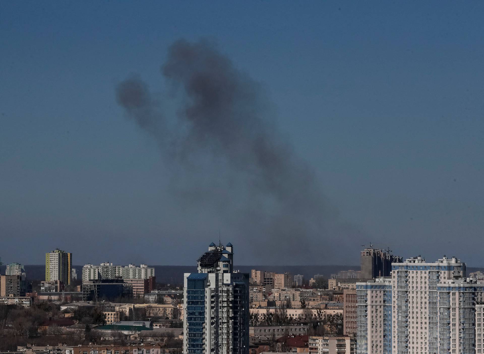 Smoke rises after shelling in Kyiv