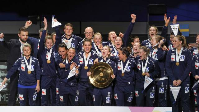The Norwegian team celebrates their gold medal during the European handball Championship at  Scandinavium Arena in Gothenburg