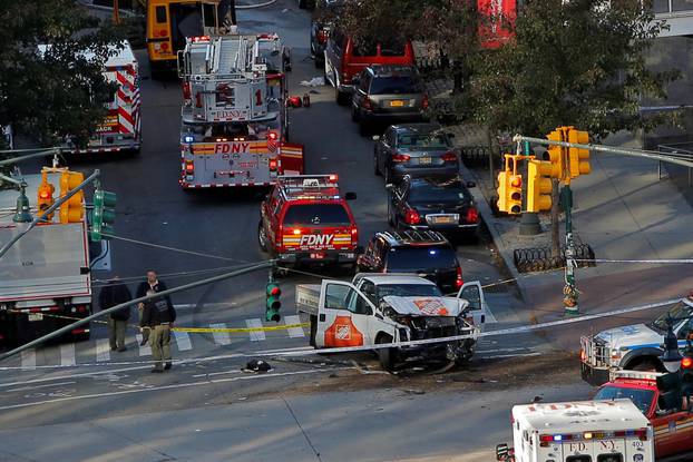 Emergency crews attend the scene of an alleged shooting incident on West Street in Manhattan, New York.