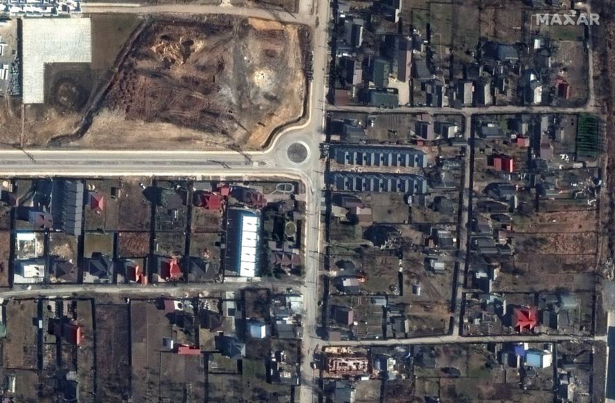 A satellite image shows an overview of Yablonska Street, in Bucha