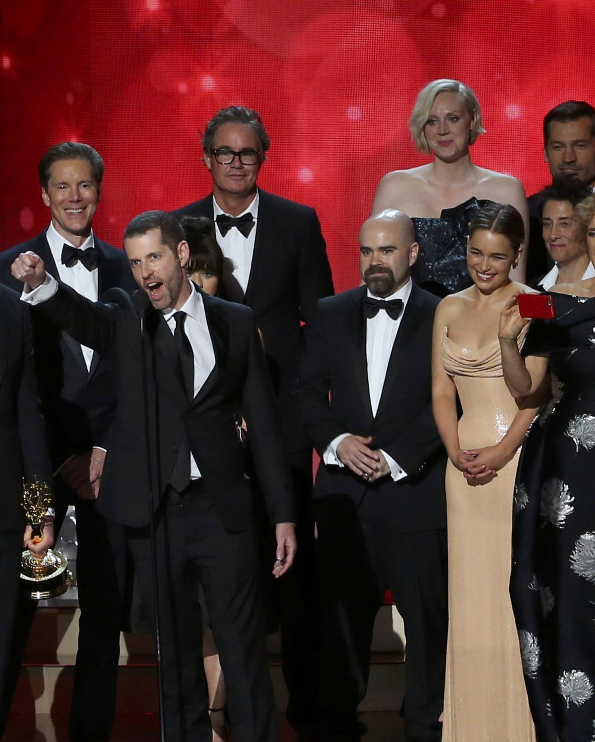 Executive Producers Benioff and Weiss accept the award for Oustanding Drama Series with the cast and crew at the 68th Primetime Emmy Awards in Los Angeles