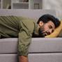 Tired,Indian,Boy,Slumps,On,Couch,Feeling,Listless.,Feeling,Depressed,
