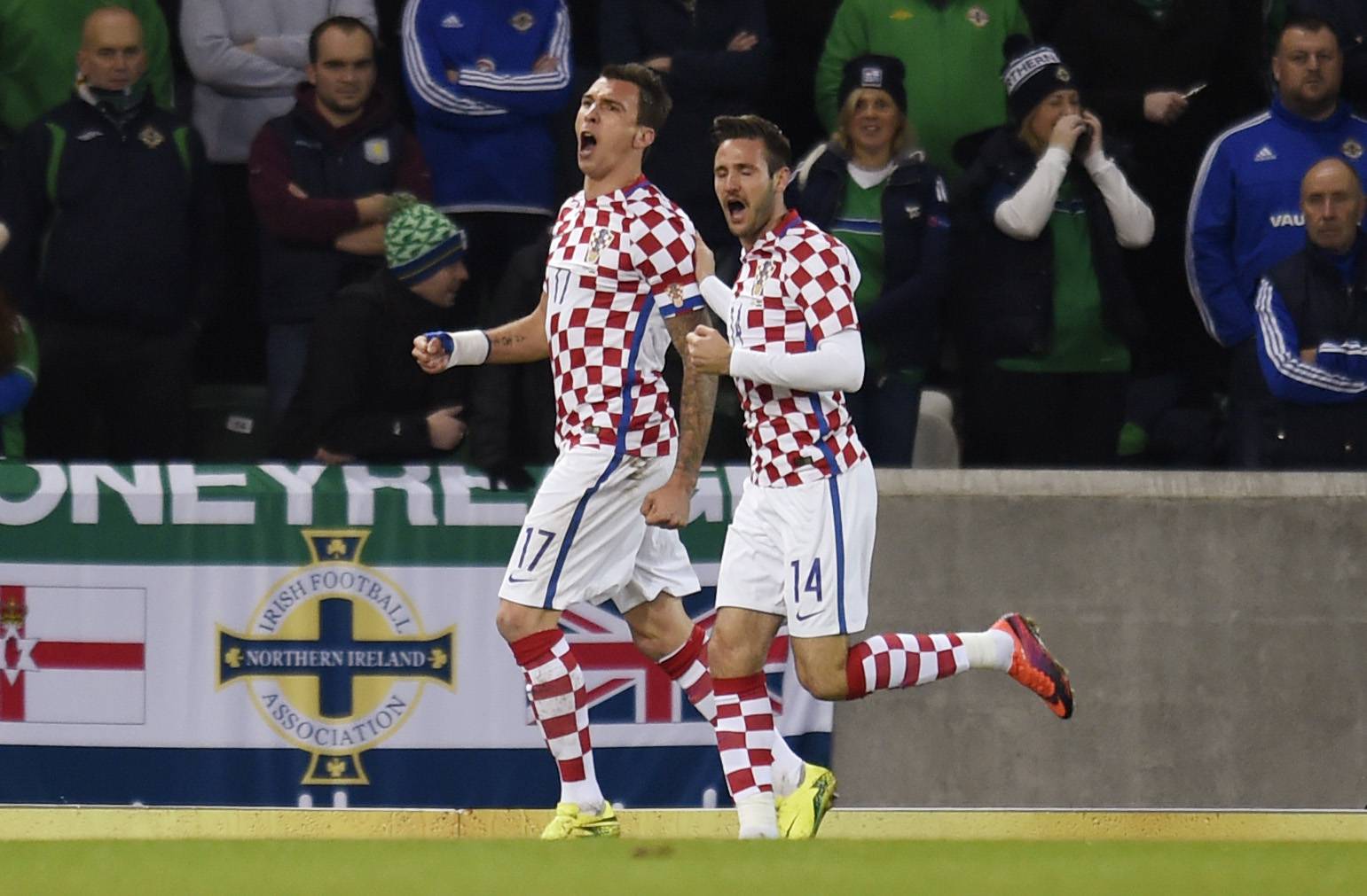 Croatia's Mario Mandzukic celebrates scoring their first goal with Duje Cop