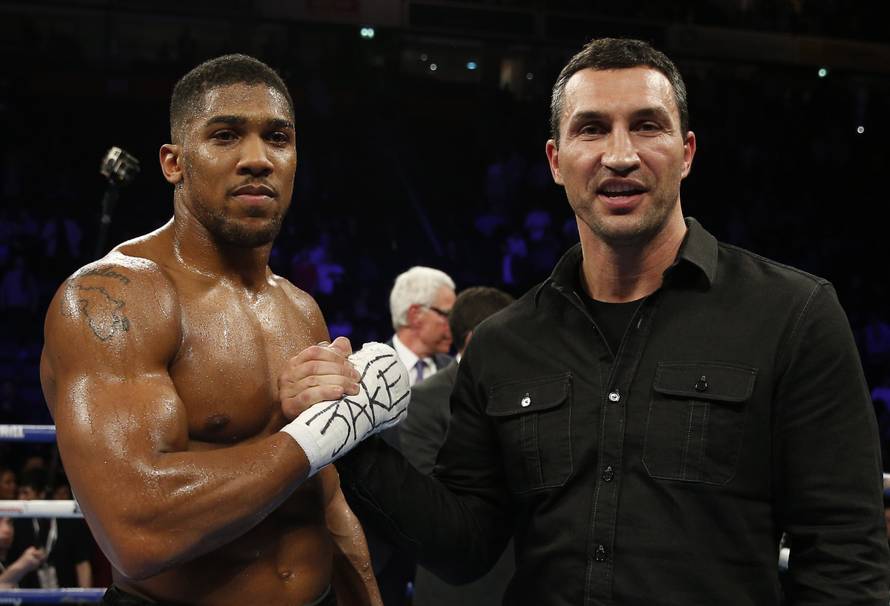 Anthony Joshua celebrates his win with Wladimir Klitschko