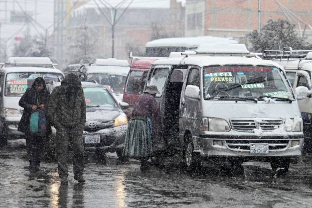 Snow falls amid low temperatures in Bolivia, in El Alto