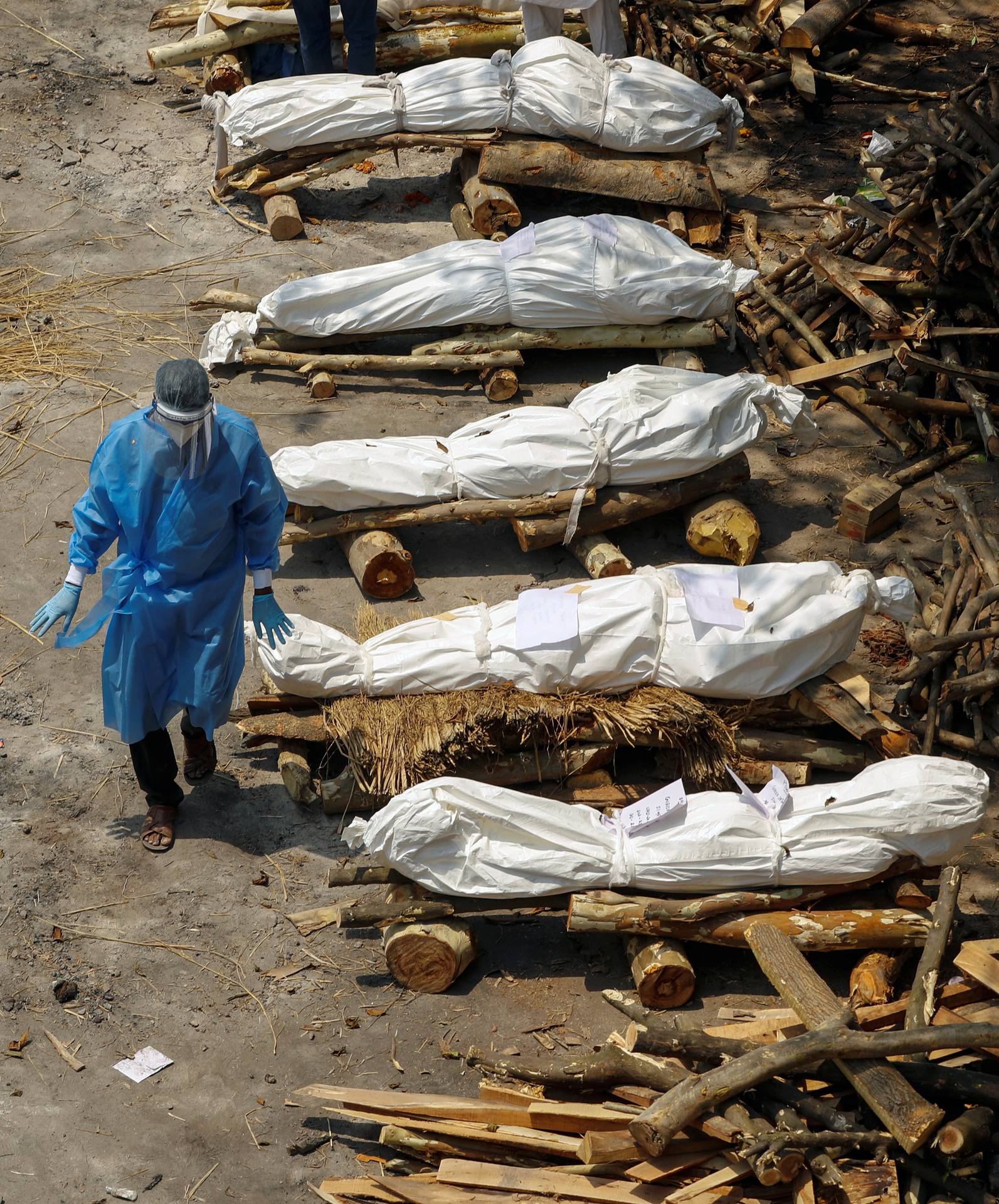 Mass cremation of coronavirus disease (COVID-19) victims at a crematorium in New Delhi