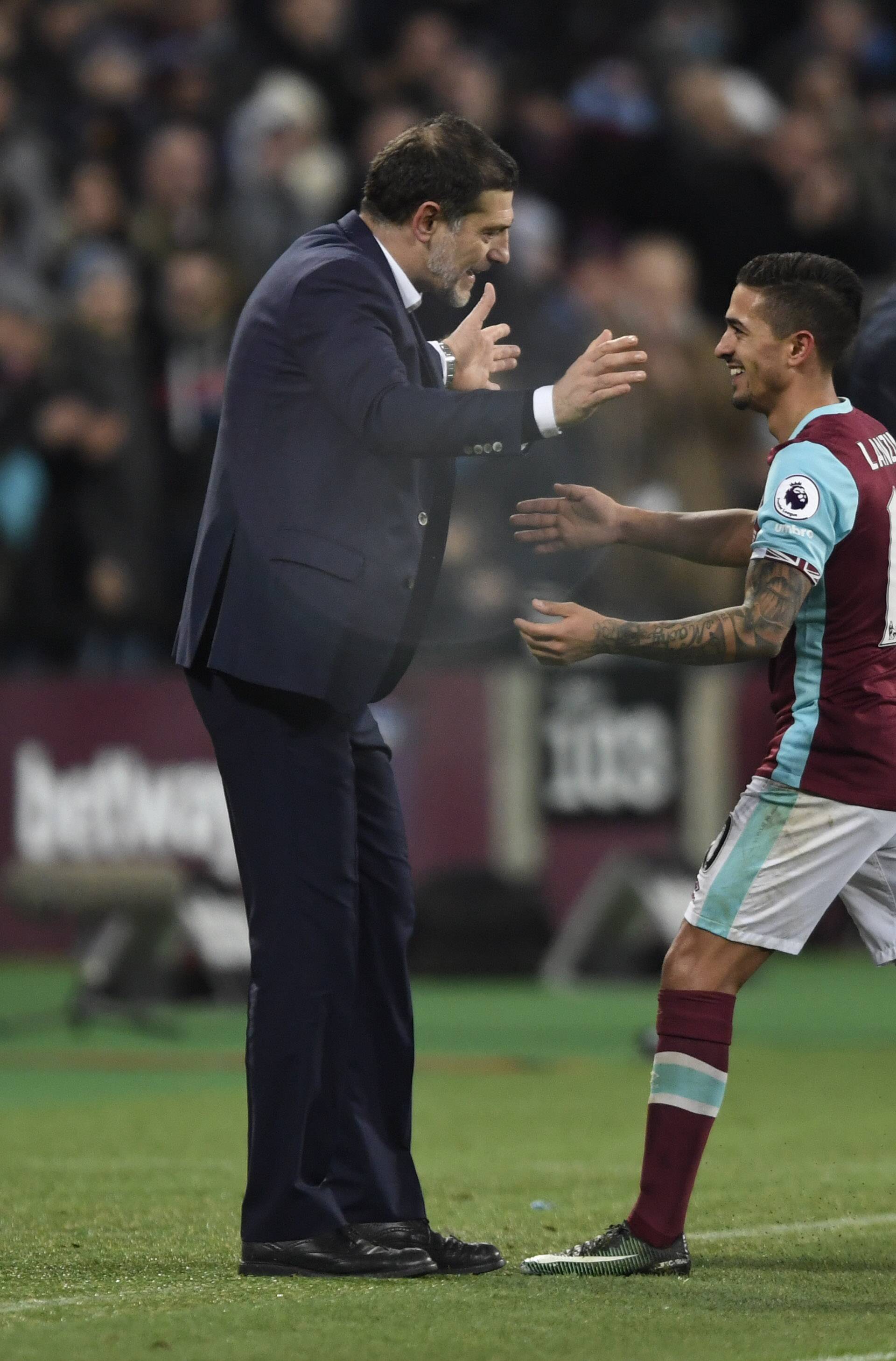 West Ham United's Manuel Lanzini is congratulated by manager Slaven Bilic as he is substituted
