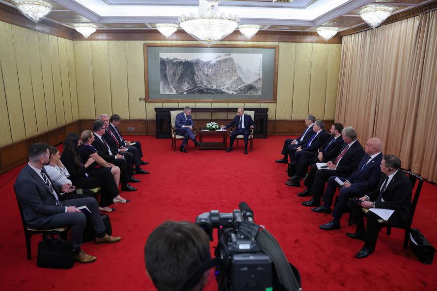 Russian President Vladimir Putin attends a meeting at Diaoyutai State Guesthouse in Beijing